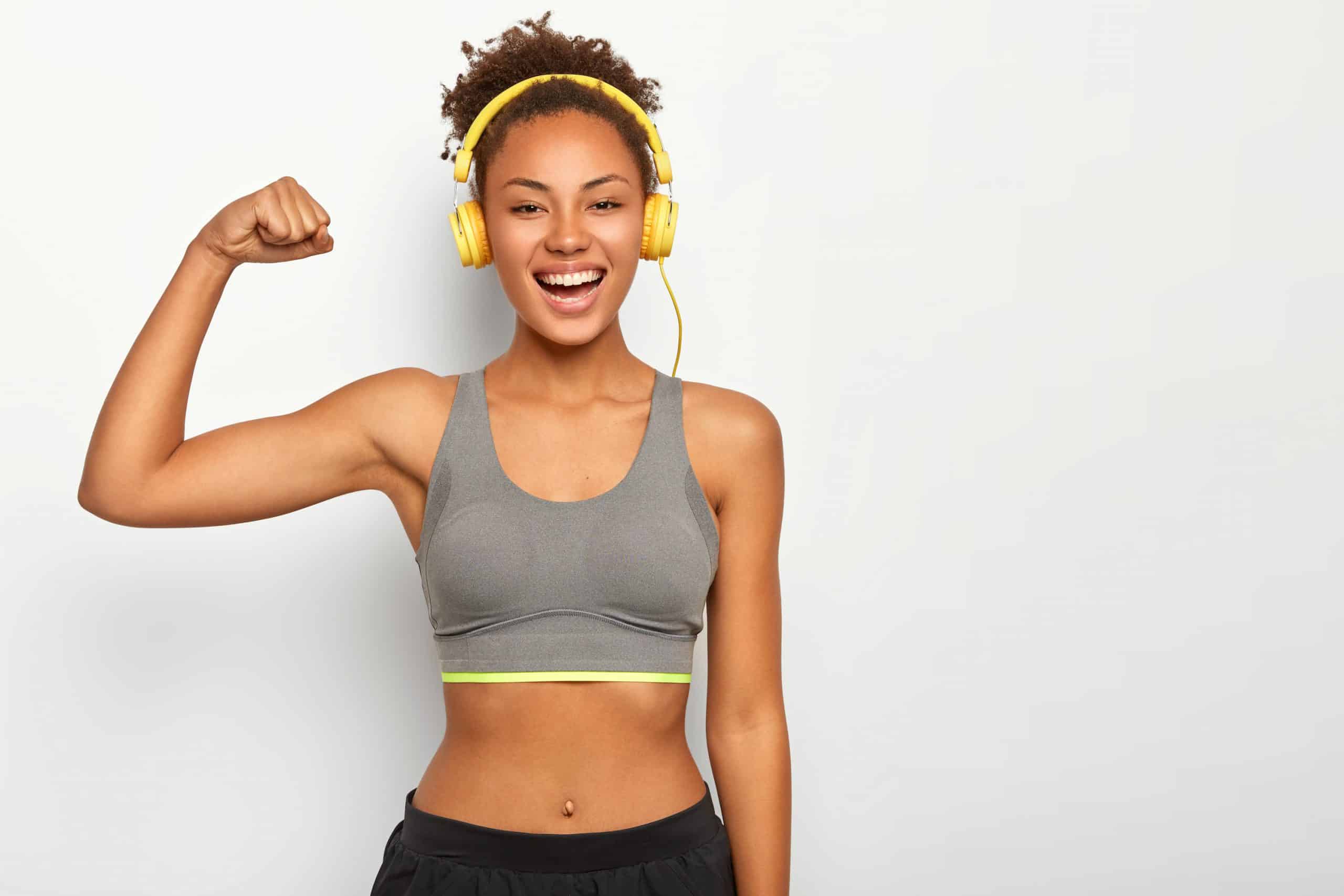young-woman-wearing-headphones-fitness