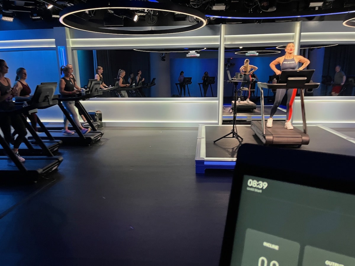 A group of people in a peloton studio.
