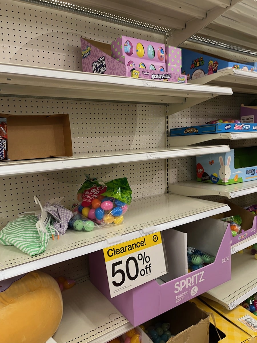 Half-empty shelves of easter products on after-easter clearance sale.