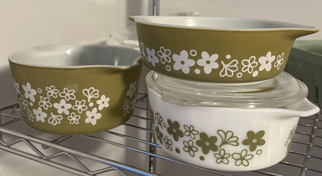 Three vintage pyrex dishes.
